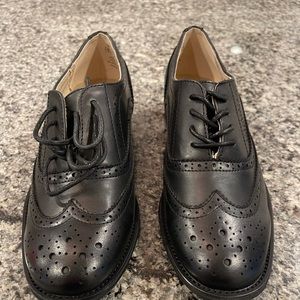 Black patent lace up Oxford, never worn.